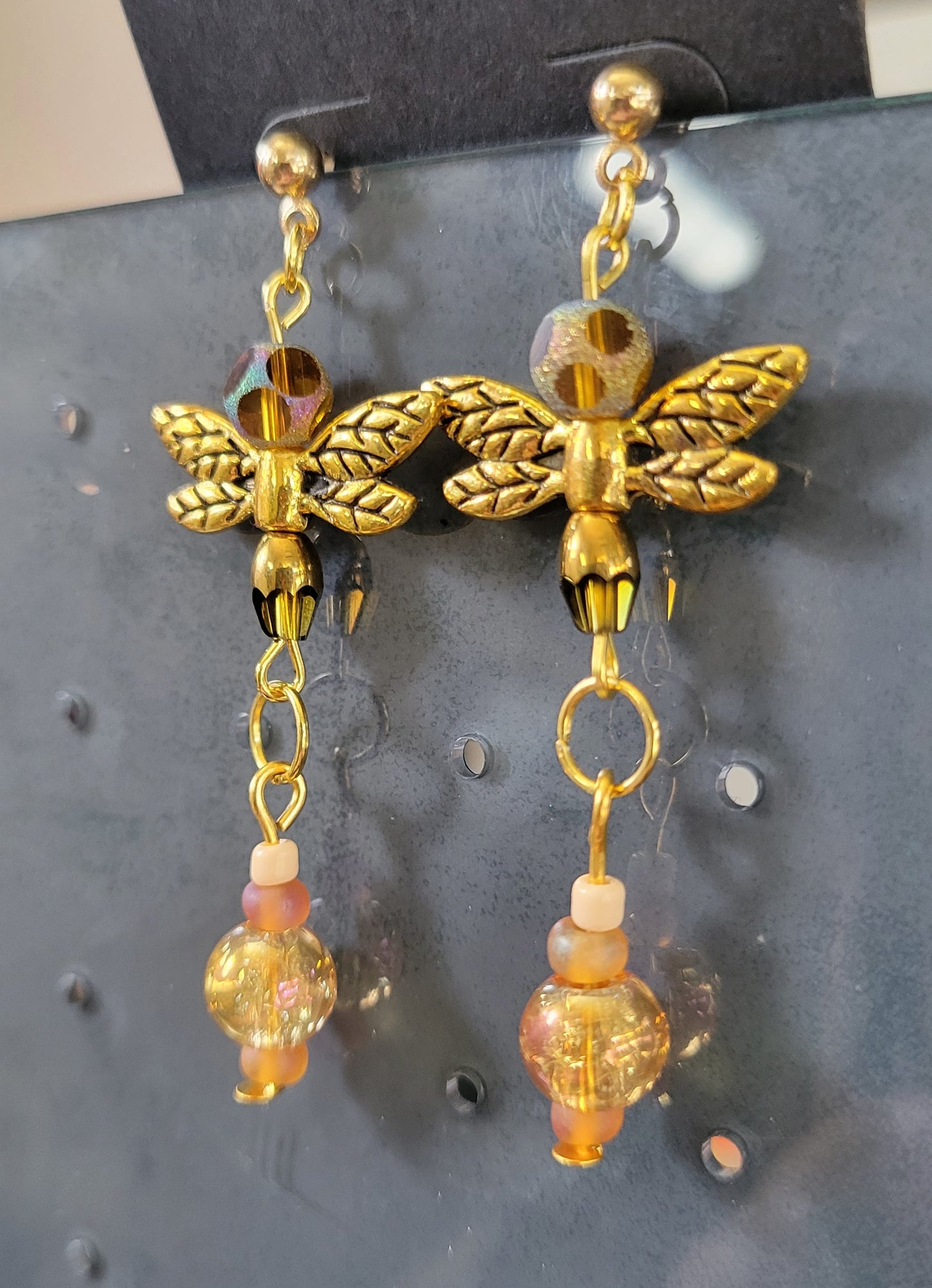Gold dragonflies