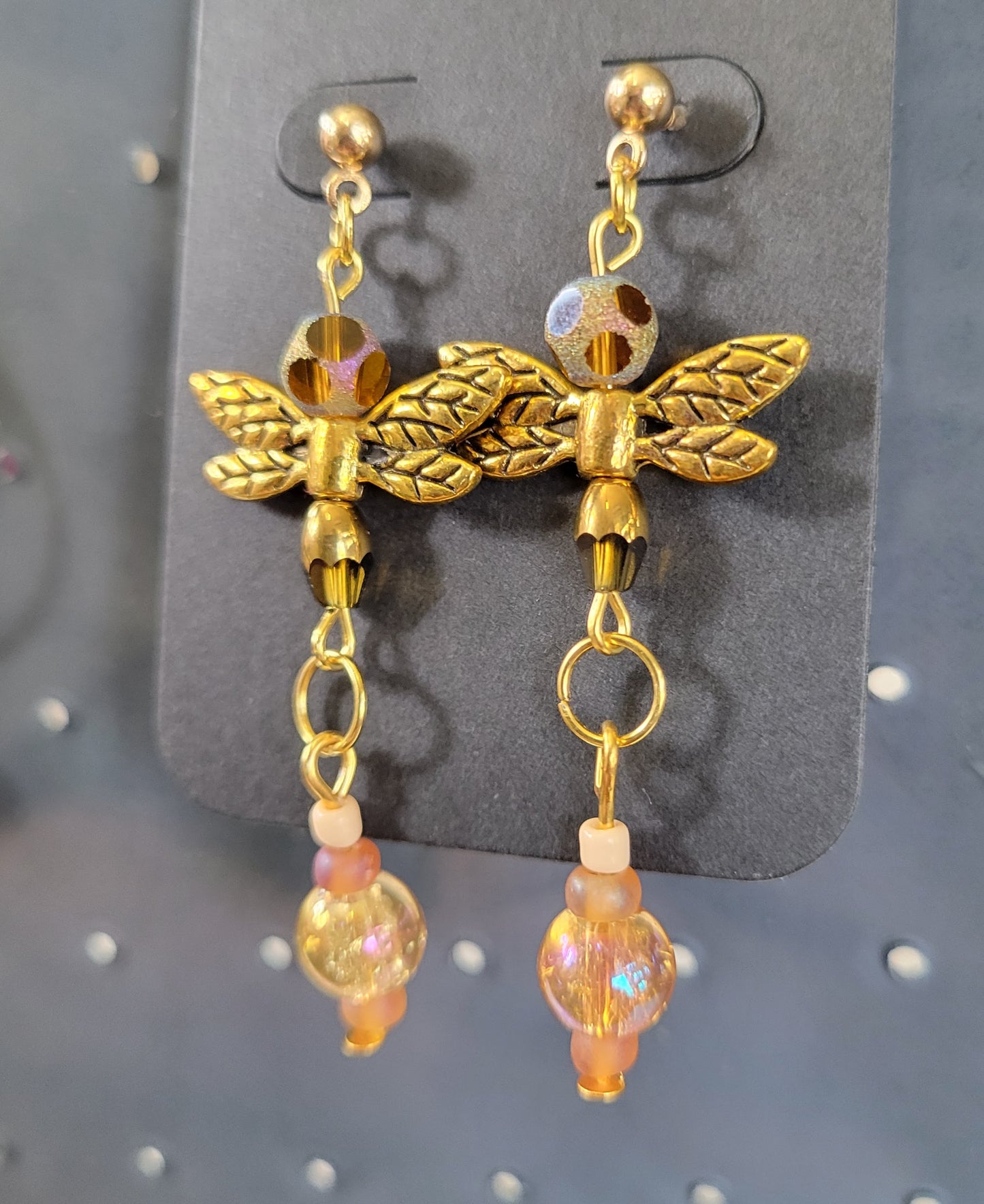 Gold dragonflies